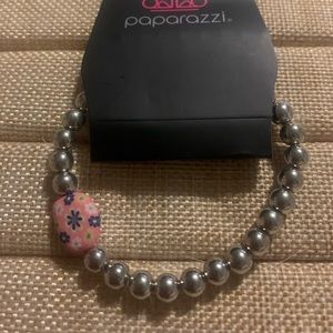 4 never worn bracelets one copper pearl bracelet gold Efiel tower bracelet